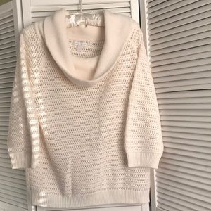 Sweater, almond color, mid sleeve.